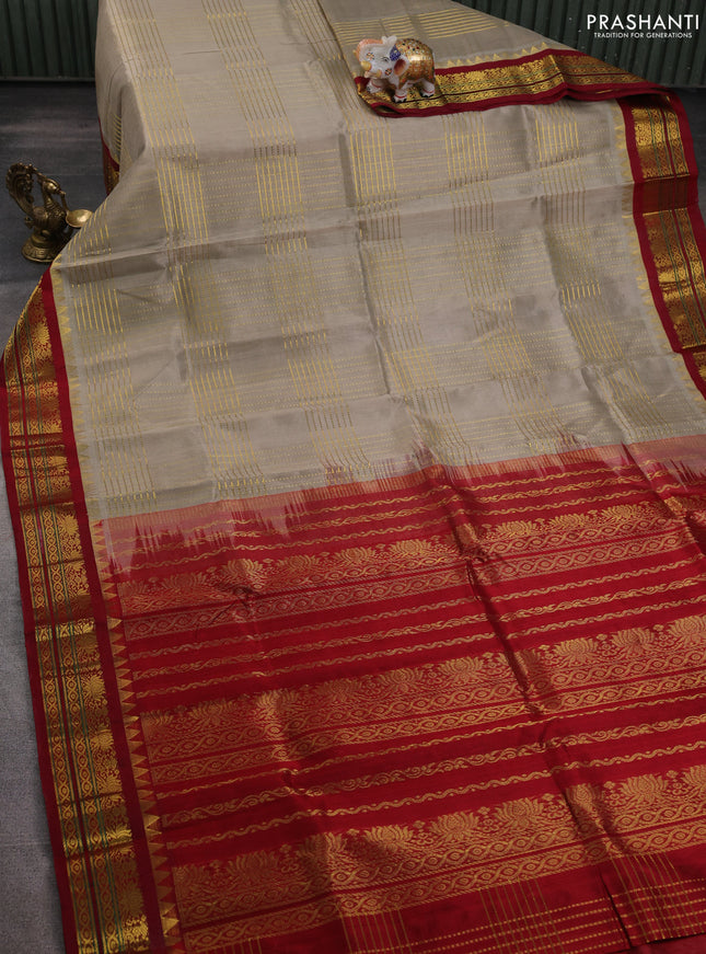 Silk cotton saree grey shade and maroon with allover zari woven checked pattern and temple design zari woven korvai border