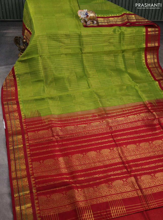Silk cotton saree light green and maroon with allover zari woven checked pattern and temple design zari woven korvai border