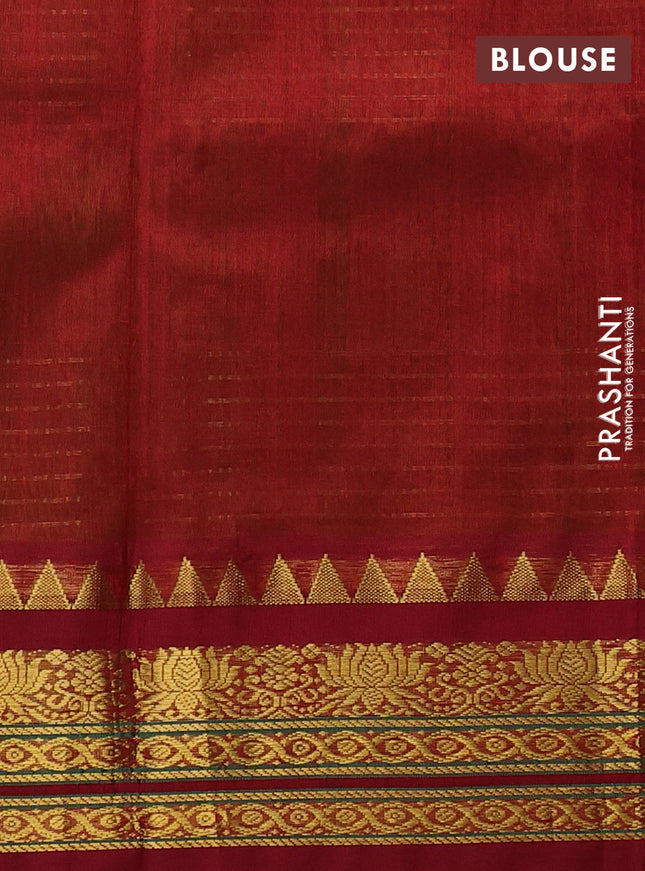Silk cotton saree light green and maroon with allover zari woven checked pattern and temple design zari woven korvai border