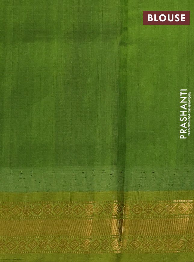 Silk cotton saree coffee brown and light green with allover zari woven checked pattern and temple design zari woven korvai border