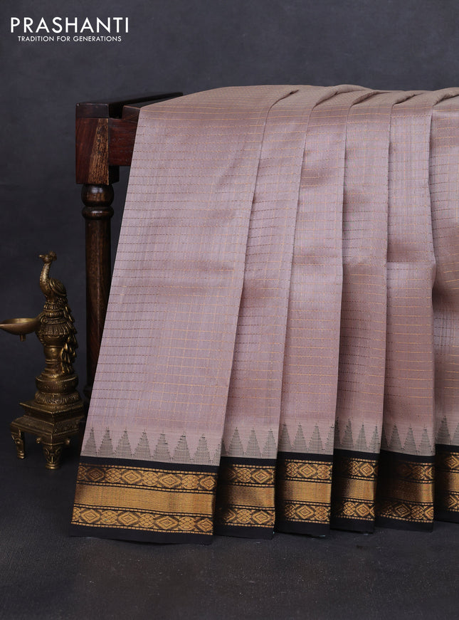 Silk cotton saree grey shade and black with allover zari woven checked pattern and temple design zari woven korvai border