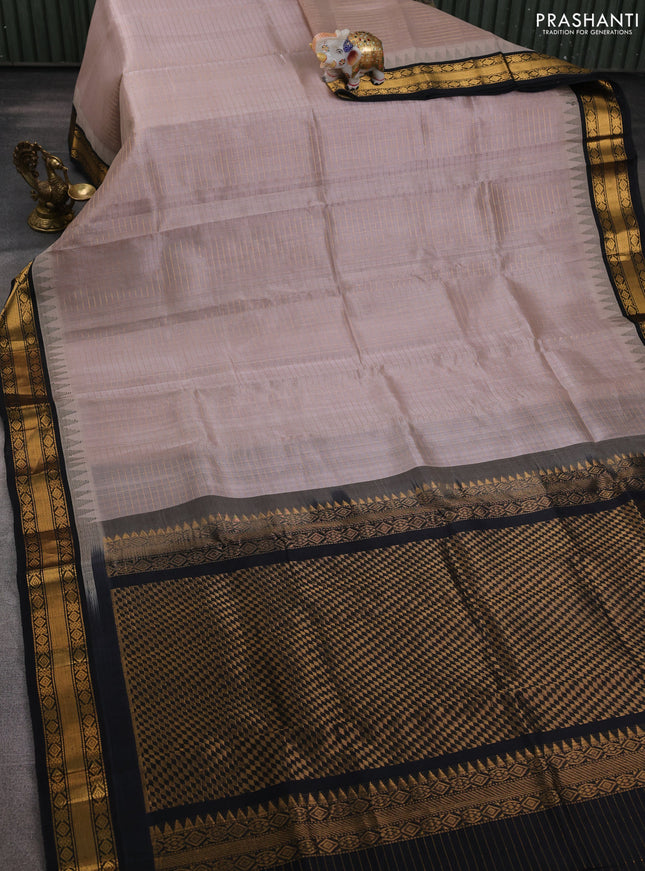 Silk cotton saree grey shade and black with allover zari woven checked pattern and temple design zari woven korvai border