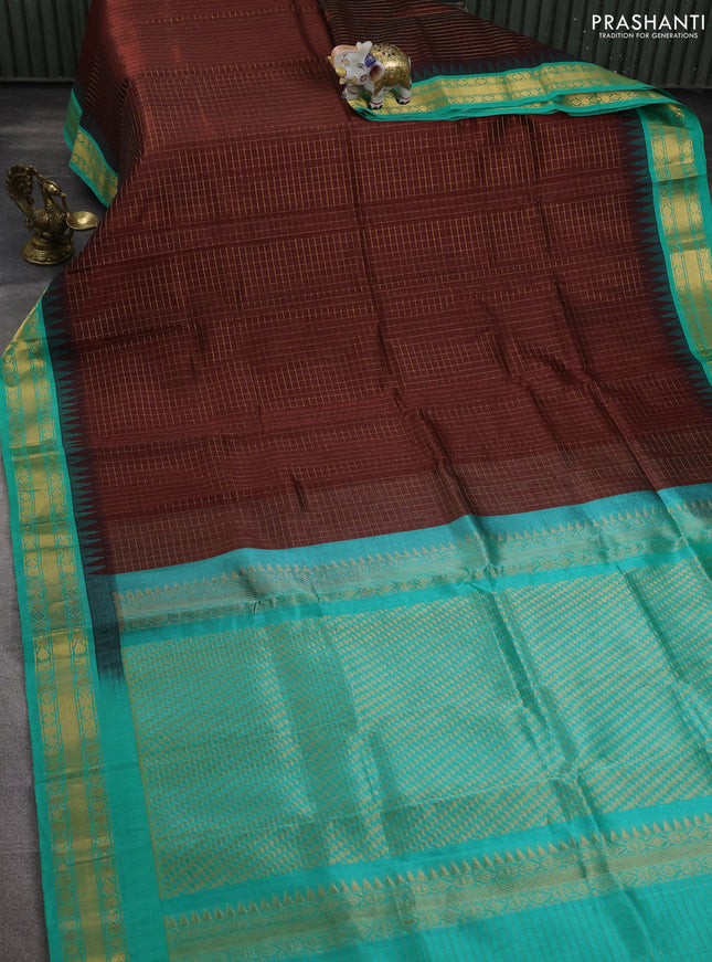 Silk cotton saree maroon and teal green shade with allover zari woven checked pattern and temple design zari woven korvai border