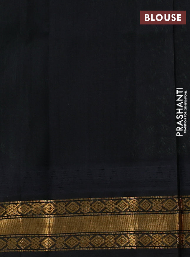 Silk cotton saree pista green and black with allover zari woven checked pattern and temple design zari woven korvai border