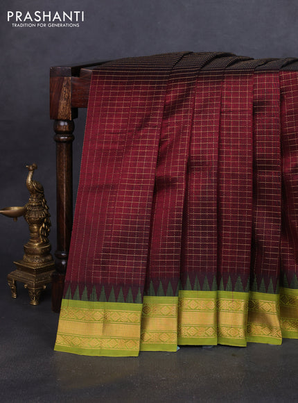 Silk cotton saree deep maroon and light green with allover small zari checked pattern and temple design zari woven korvai border