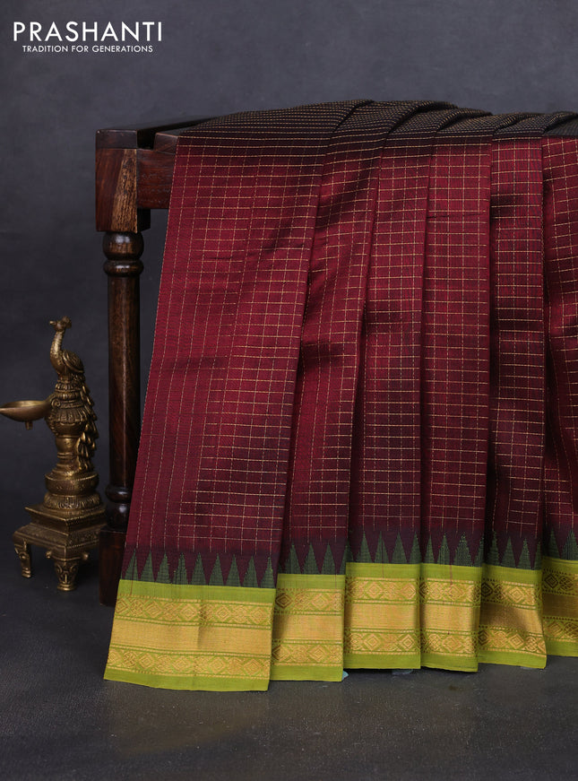 Silk cotton saree deep maroon and light green with allover small zari checked pattern and temple design zari woven korvai border