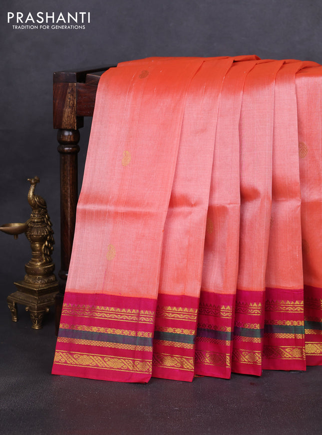 Silk cotton saree peach orange and pink with paisley zari woven buttas and zari woven korvai border