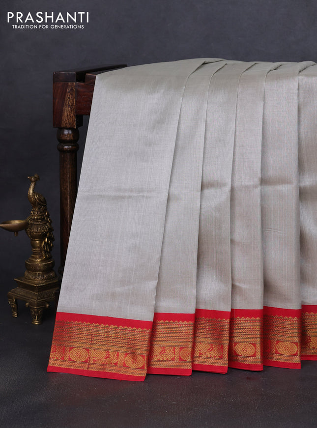 Silk cotton saree pastel grey and red with plain body and zari woven korvai border