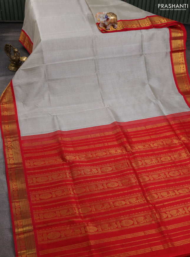 Silk cotton saree pastel grey and red with plain body and zari woven korvai border
