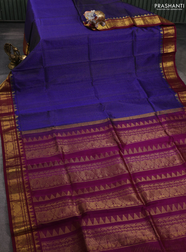 Silk cotton saree blue and wine shade with allover small zari checked pattern and annam zari woven korvai border