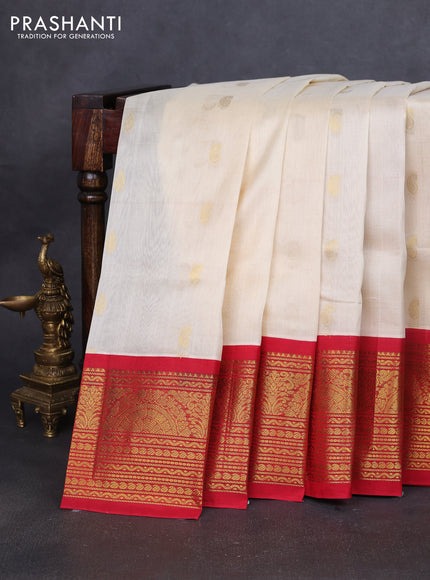Silk cotton saree cream and red with zari woven buttas and long zari woven korvai border