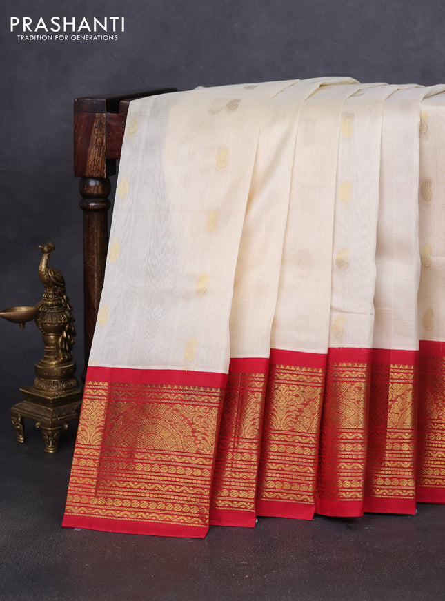 Silk cotton saree cream and red with zari woven buttas and long zari woven korvai border