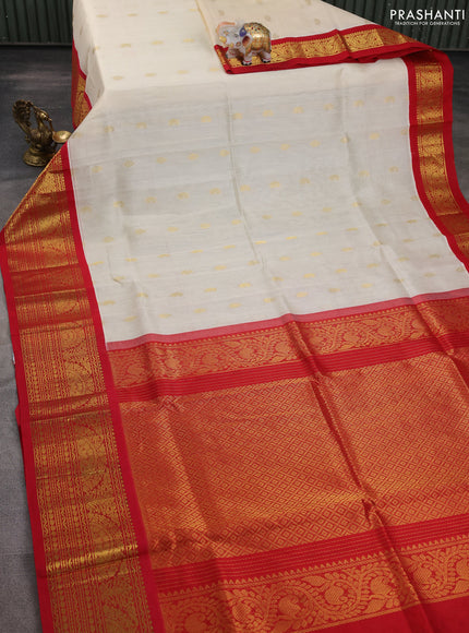 Silk cotton saree cream and red with zari woven buttas and long zari woven korvai border