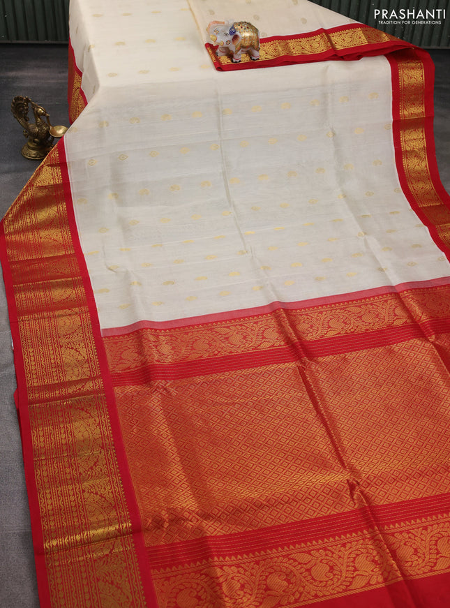 Silk cotton saree cream and red with zari woven buttas and long zari woven korvai border