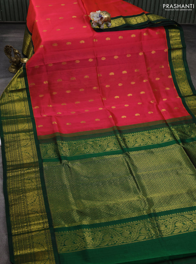 Silk cotton saree pink shade and green with paisley zari woven buttas and long zari woven korvai border