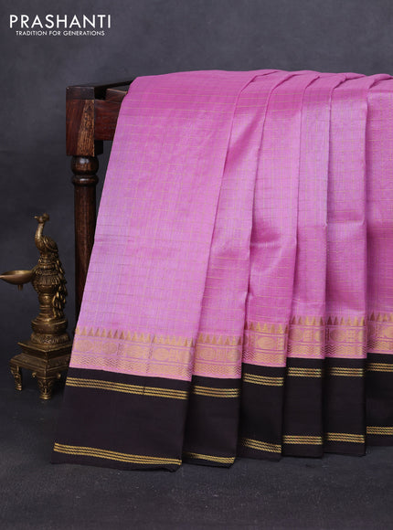 Silk cotton saree mild lavender and black with allover zari woven checked pattern and long rettapet zari woven border