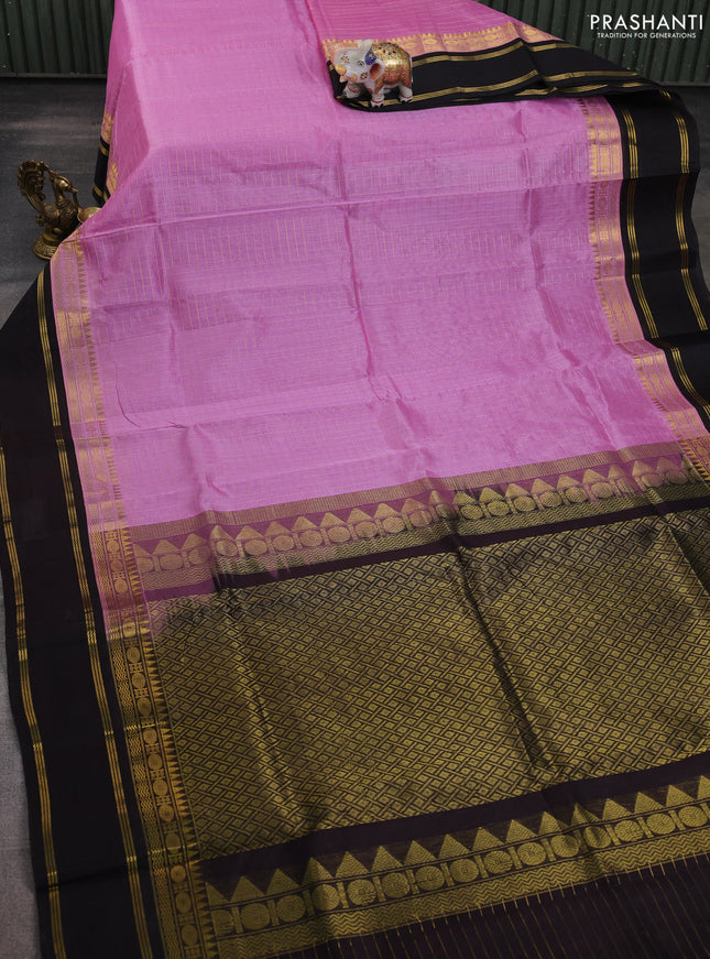 Silk cotton saree mild lavender and black with allover zari woven checked pattern and long rettapet zari woven border