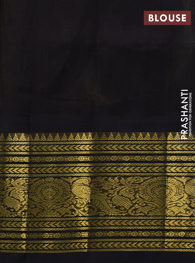 Silk cotton saree pista green and black with zari woven buttas and long zari woven korvai border