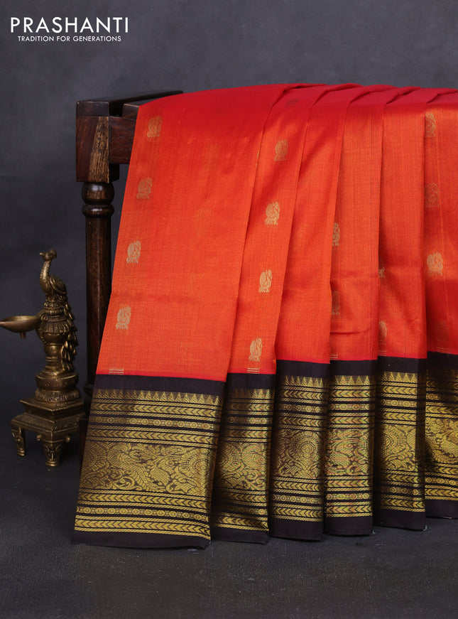 Silk cotton saree orange and coffee brown with zari woven buttas and long zari woven korvai border