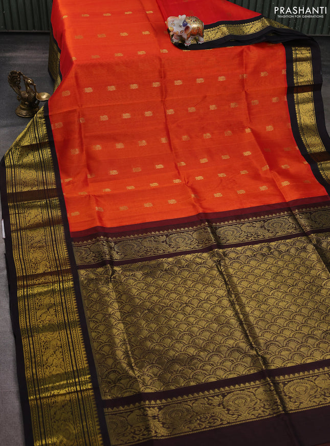 Silk cotton saree orange and coffee brown with zari woven buttas and long zari woven korvai border