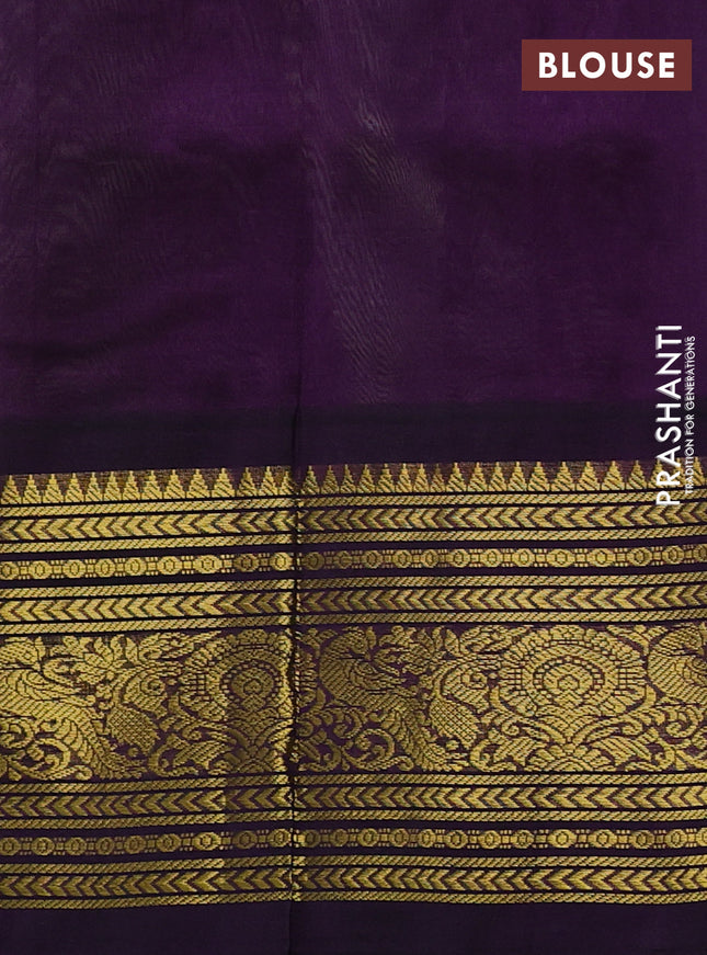 Silk cotton saree mild pita green and purple with zari woven buttas and long zari woven korvai border