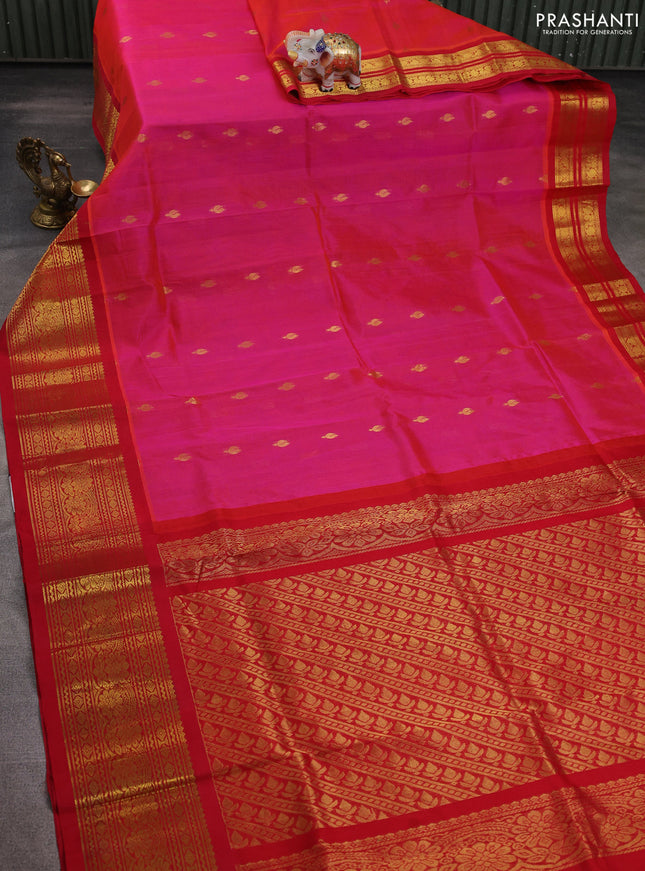 Silk cotton saree dual shade of pinkish orange and red with zari woven buttas and long zari woven korvai border