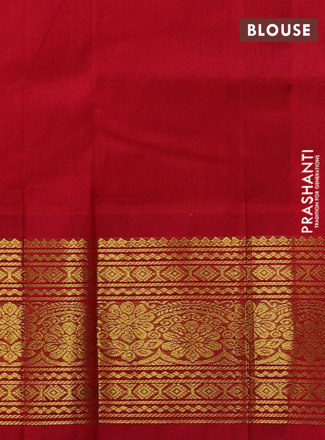 Silk cotton saree dual shade of pinkish orange and red with zari woven buttas and long zari woven korvai border