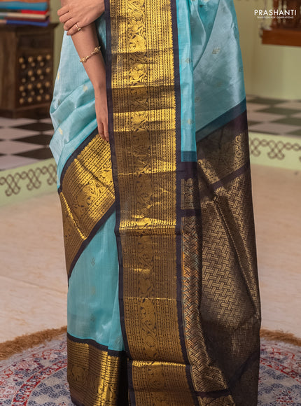 Silk cotton saree teal blue and dark blue with zari woven buttas and long zari woven korvai border
