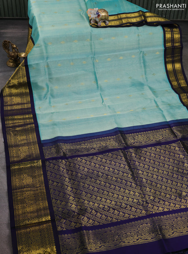 Silk cotton saree teal blue and dark blue with zari woven buttas and long zari woven korvai border