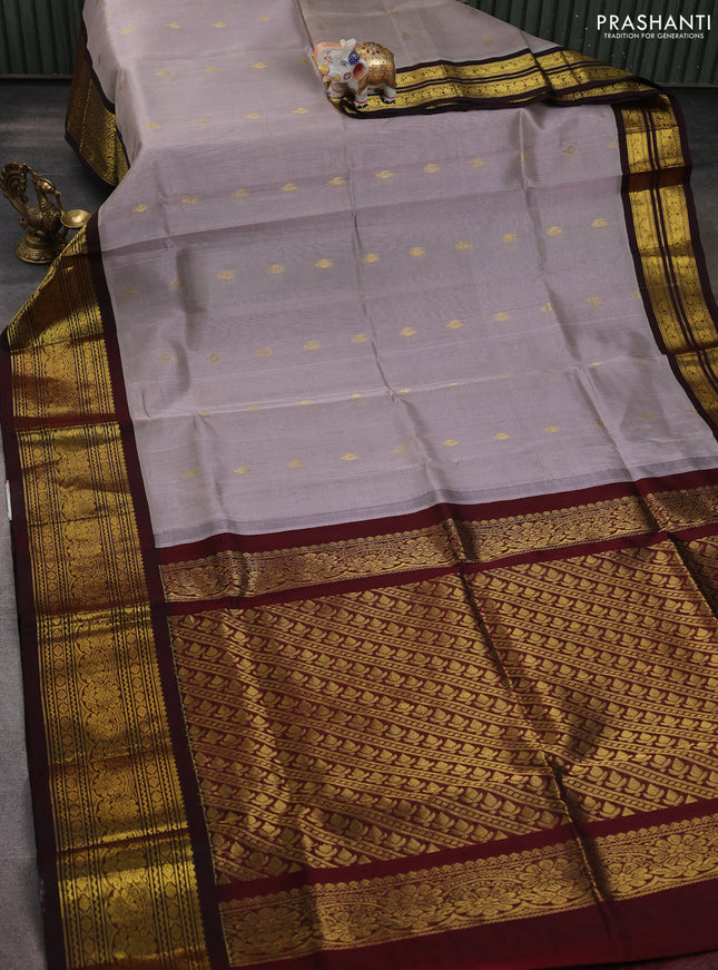Silk cotton saree grey and deep maroon with zari woven buttas and long zari woven korvai border