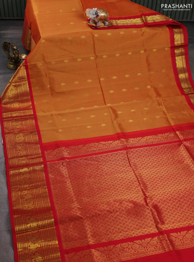 Silk cotton saree dark mustard and red with zari woven buttas and long zari woven korvai border