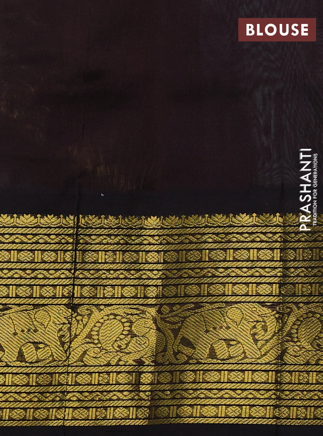 Silk cotton saree teal blue and coffee brown with zari woven buttas and long zari woven korvai border