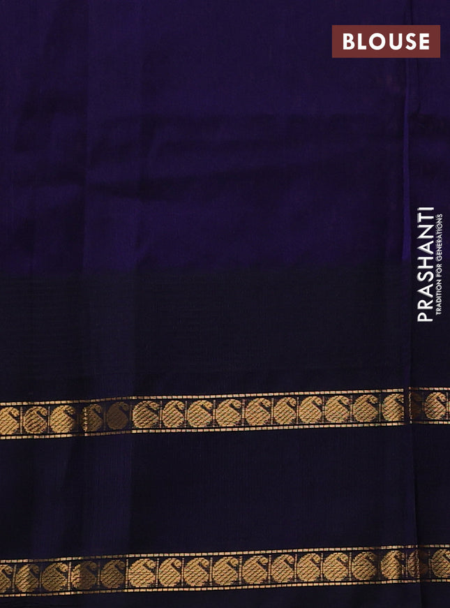 Silk cotton saree pale orange and navy blue with paisley zari woven buttas and temple design rettapet zari woven korvai border