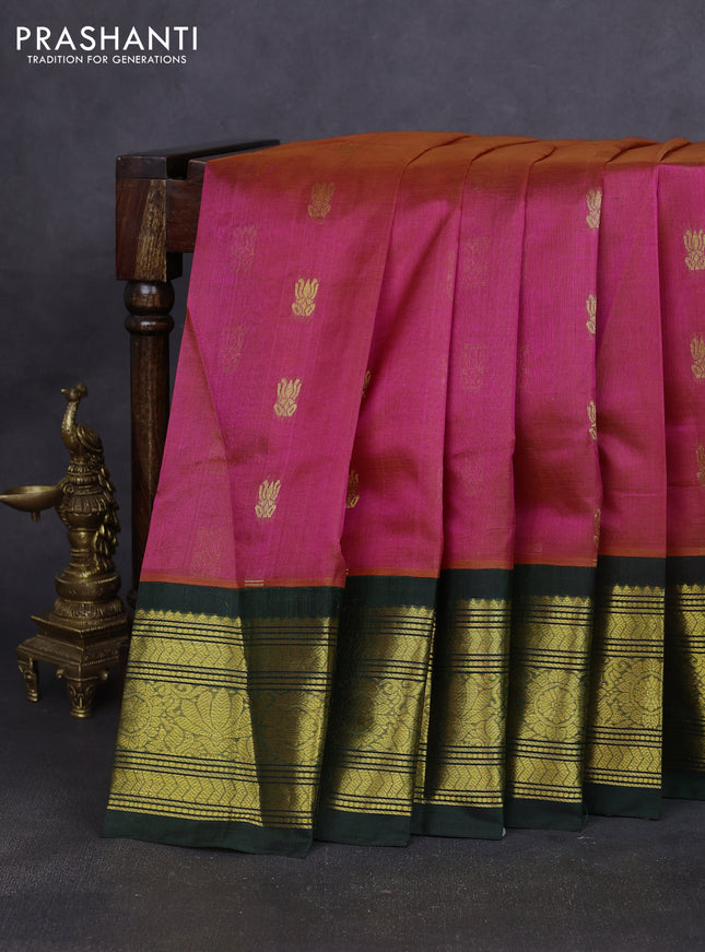 Silk cotton saree dual shade of pinkish orange and bottle green with zari woven buttas and long zari woven korvai border