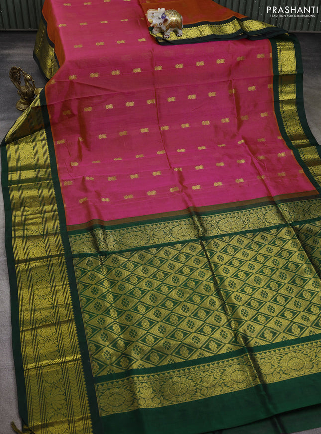 Silk cotton saree dual shade of pinkish orange and bottle green with zari woven buttas and long zari woven korvai border