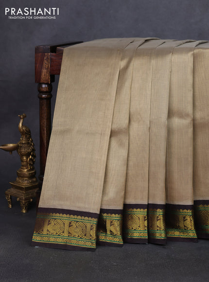 Silk cotton saree khaki shade and deep coffee brown with plain body and annam zari woven korvai border