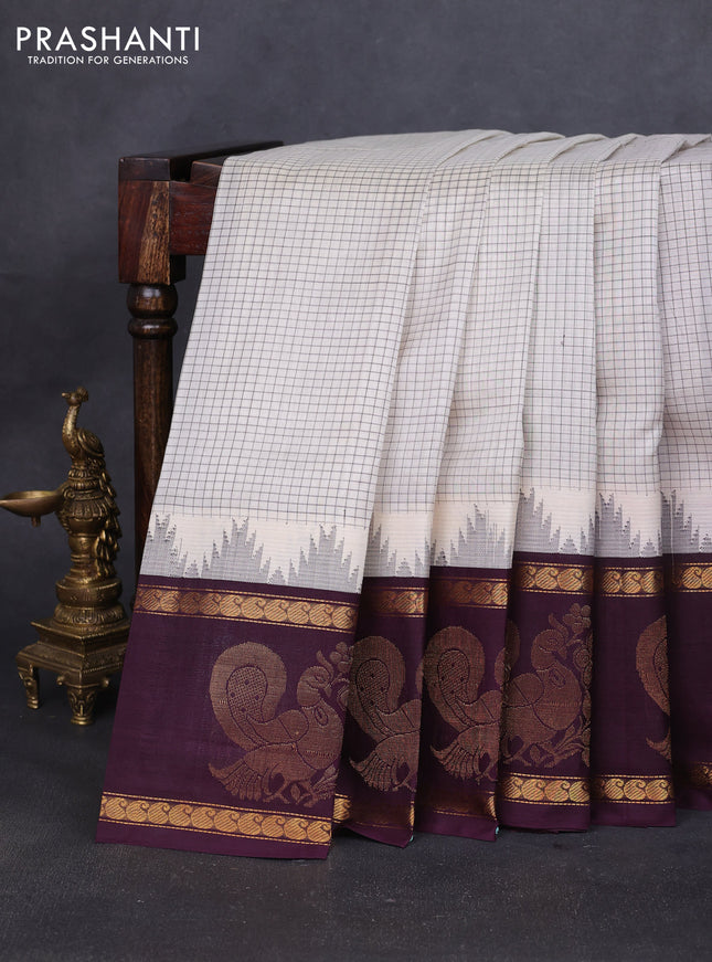 Silk cotton saree cream and wine shade with allover small checked pattern and temple design zari woven butta border