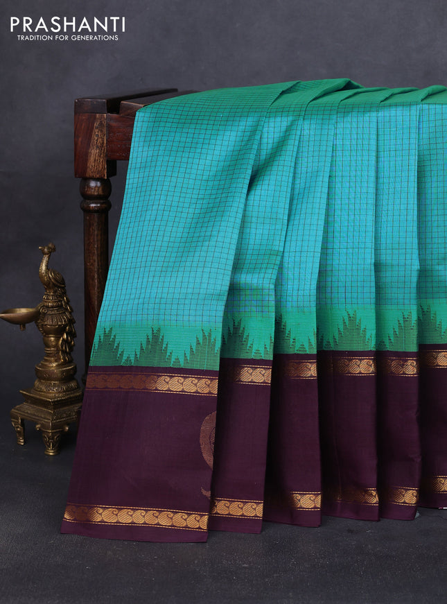 Silk cotton saree teal blue and jamun shade with allover small checked pattern and temple design zari woven butta border