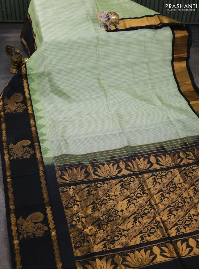 Silk cotton saree pista green and black with allover small checked pattern and temple design zari woven butta border