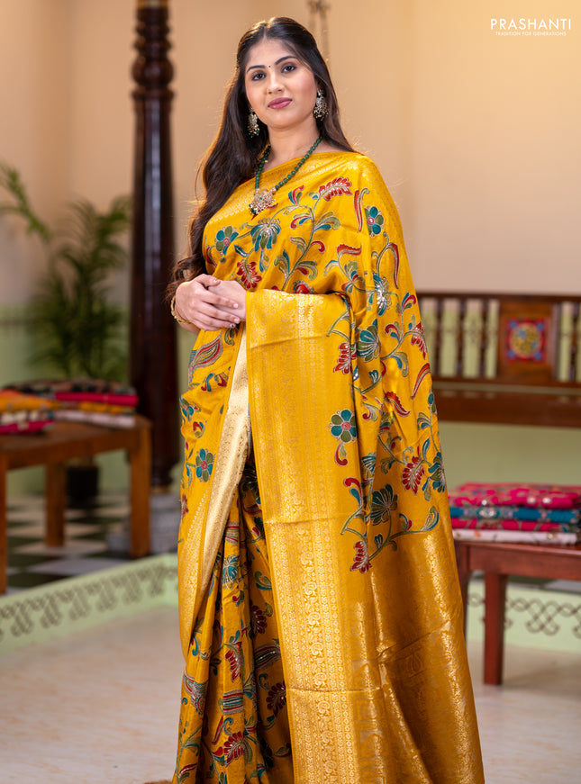 Banarasi crepe saree mustard yellow with kalamkari prints & sequin embroidery work and zari woven border