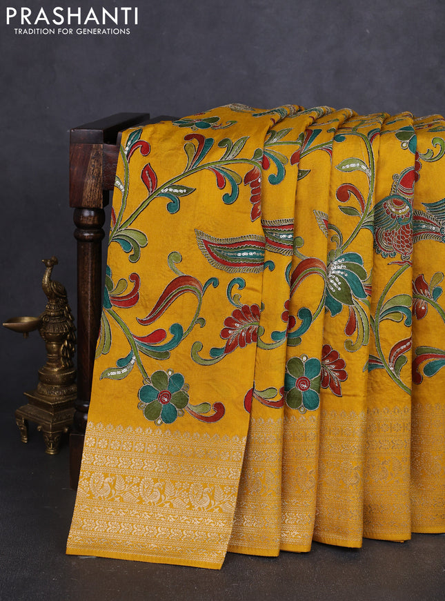 Banarasi crepe saree mustard yellow with kalamkari prints & sequin embroidery work and zari woven border