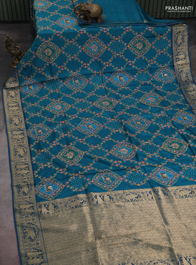 Banarasi crepe saree peacock green and peacock blue with prints & sequin embroidery work and zari woven border