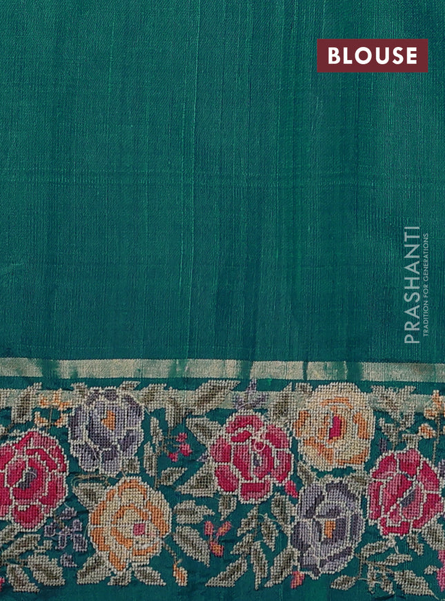 Pure dupion silk saree teal green shade with allover zari woven buttas and zari woven floral embroidery border