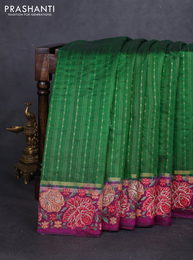 Pure dupion silk saree green and purple with allover zari weaves and zari woven floral embroidery border