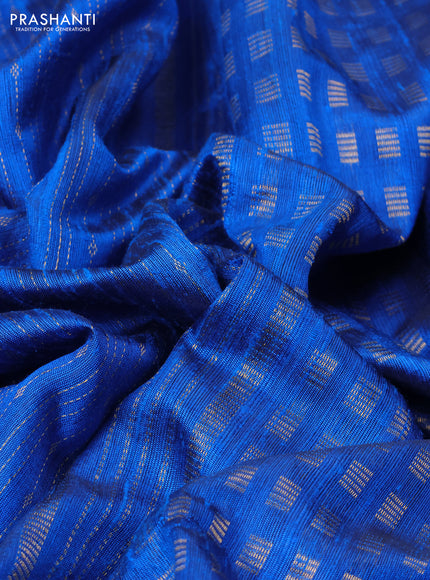 Pure dupion silk saree cs blue with allover zari weaves and zari woven embroidery border