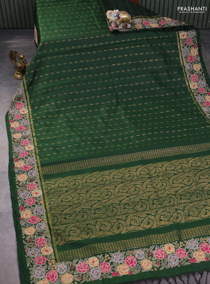 Pure dupion silk saree sap green with allover zari woven buttas and zari woven floral embroidery border