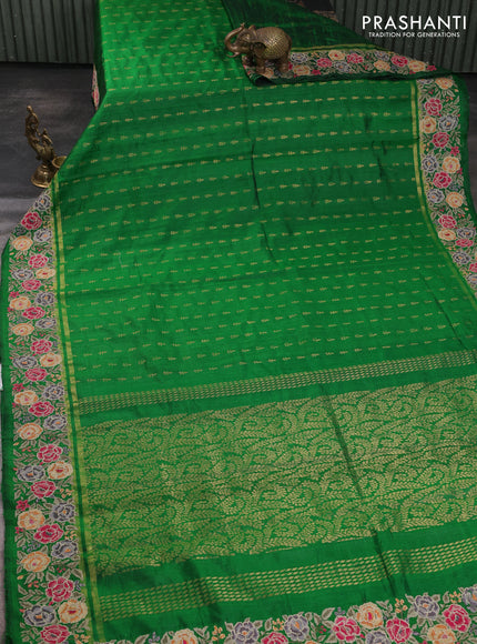 Pure dupion silk saree green with allover zari woven buttas and zari woven floral embroidery border