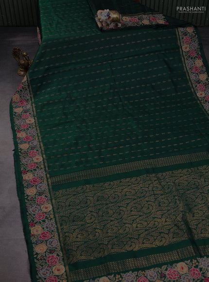 Pure dupion silk saree dark peacock green with allover zari woven buttas and zari woven floral embroidery border