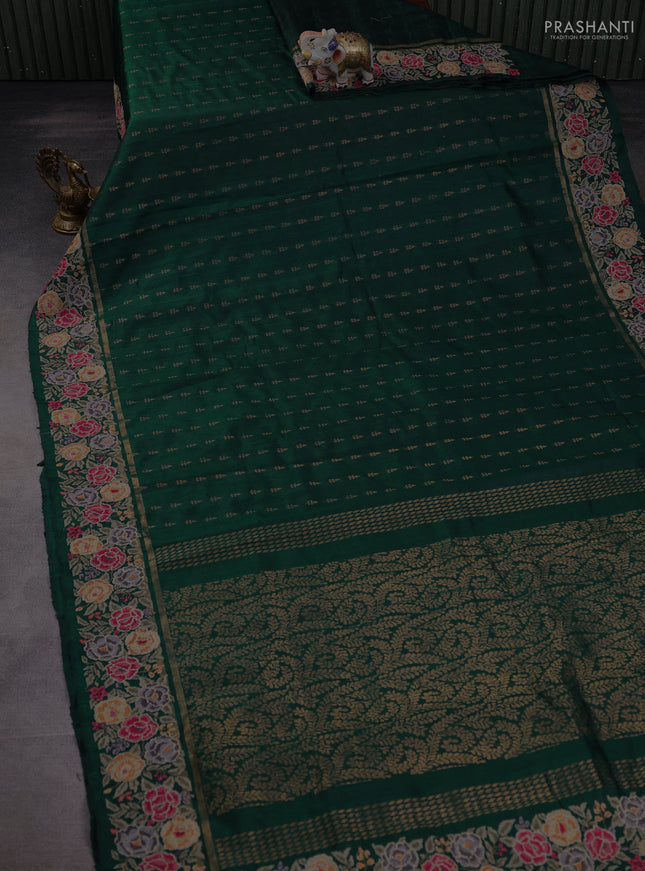 Pure dupion silk saree dark peacock green with allover zari woven buttas and zari woven floral embroidery border