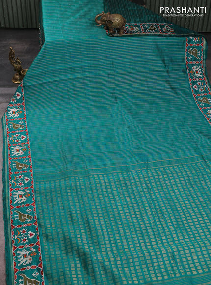 Pure dupion silk saree teal gren with allover thread & zari weaves and ikat design embroidered border